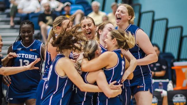 Victoria celebrates winning the women's gold medal at the -24 Under-20 and Ivor Burge National Championships. Picture: Taylor Earnshaw