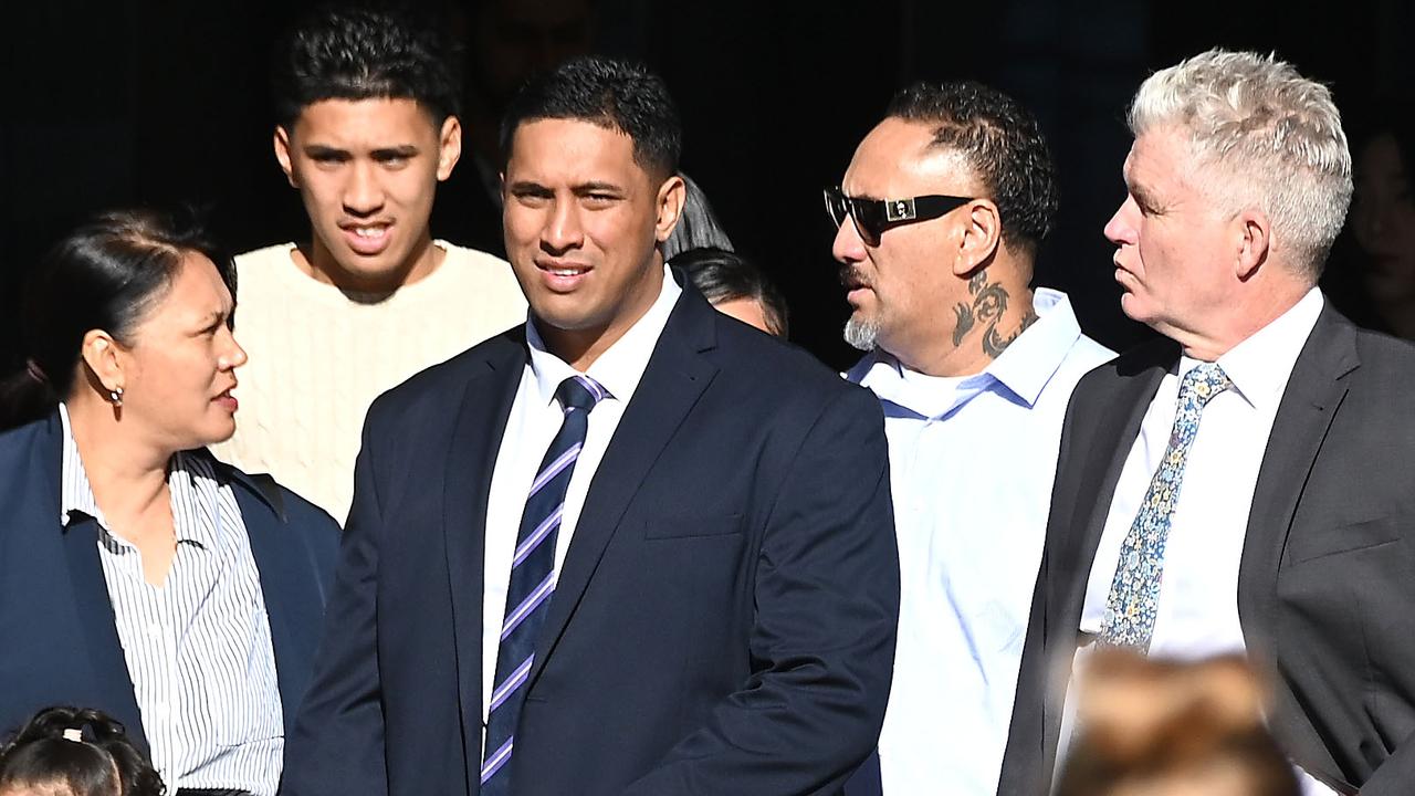 BRISBANE, AUSTRALIA - NewsWire Photos JUNE 3, 2025: Mr Tuiasau (centre), flanked by family and supporters, as well as defence counsel Craig Eberhardt KC (right). Picture: NewsWire / John Gass