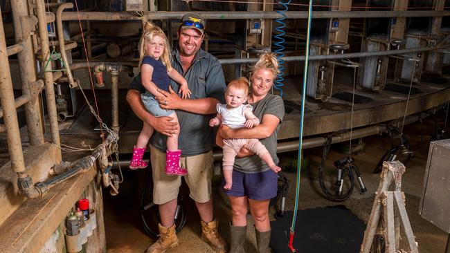 Ryan and Brighid Langley, sharefarmers for Circular Head Farms at Redpa, with their children Hannah, 3, and Peyton, 1. Picture: Phillip Biggs