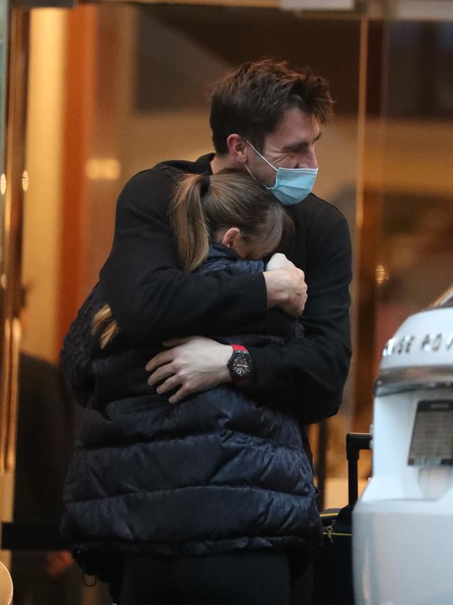 Pat Cummins embraces his pregnant partner Becky Boston. Picture: John Grainger