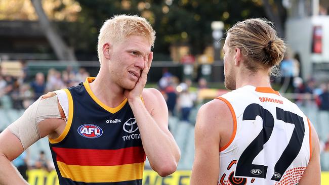 Harry Himmelberg (right) got the chocolates over his brother, Elliott. Picture: Sarah Reed/AFL Photos/Getty Images