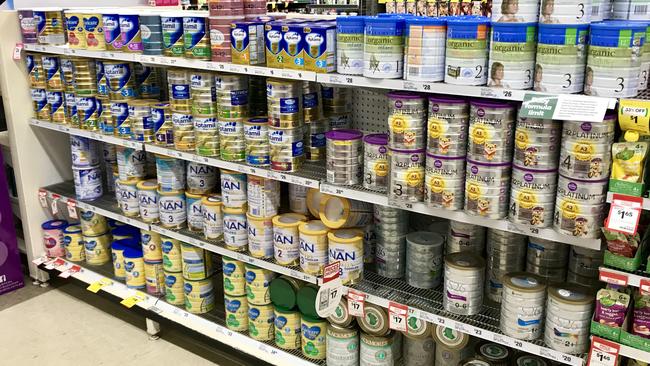 Baby formula pictured on the shelves at a supermarket.