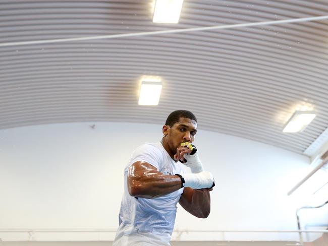 Anthony Joshua trains during a media workout in Sheffield, England.