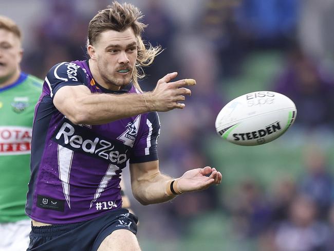 MELBOURNE, AUSTRALIA - JULY 17: Ryan Papenhuyzen of the Storm passes the ball during the round 18 NRL match between the Melbourne Storm and the Canberra Raiders at AAMI Park, on July 17, 2022, in Melbourne, Australia. (Photo by Mike Owen/Getty Images)