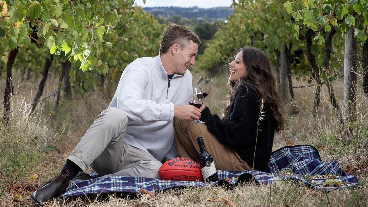 Jordan Dawson with fiancee Milly Dutton. Picture Sarah Reed / TLA