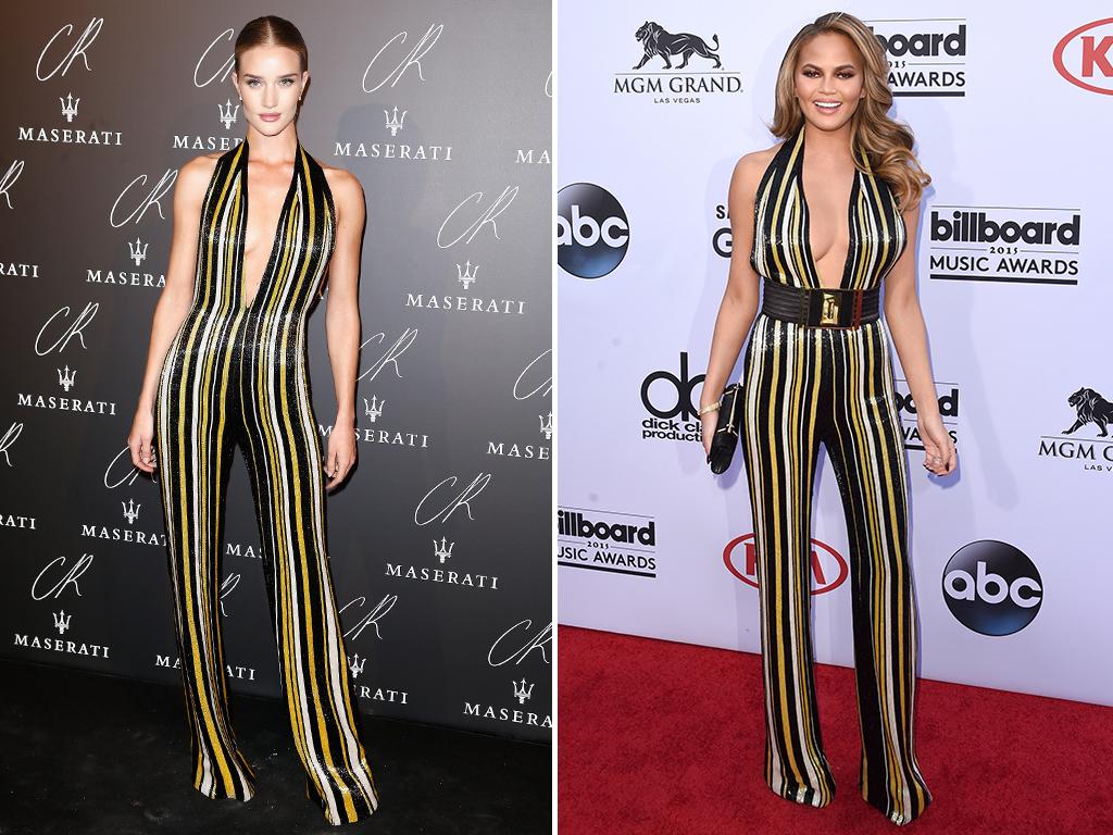 Who wore Balmain onsie better? Rosie Huntington Whiteley wore this low cut playsuit to a fashion event last October. Chrissy Teigen wore the look once again to this year’s Billboard Awards. Picture: Getty