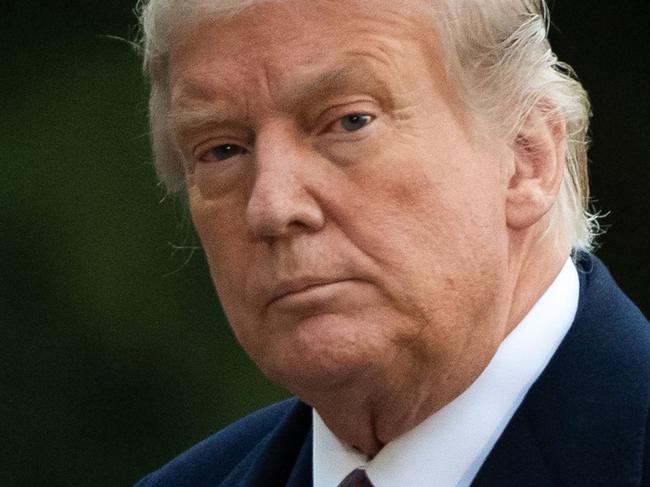 US President Donald Trump walks from Marine One after arriving on the South Lawn of the White House in Washington, DC, October 1, 2020, following campaign events in New Jersey. (Photo by SAUL LOEB / AFP)