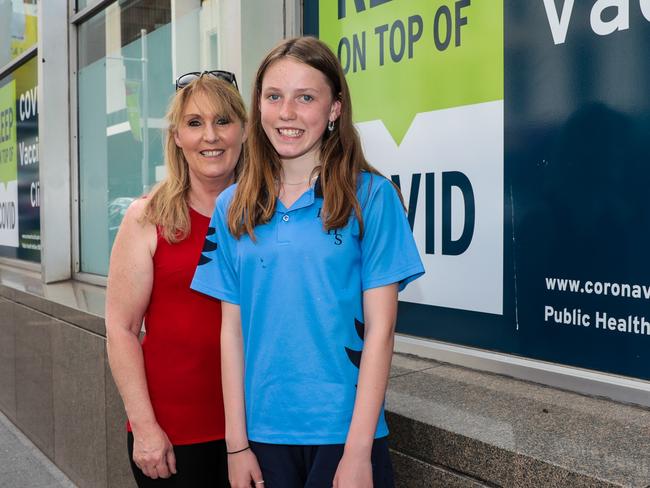 Bella Lovell with her grandmother Michelle Earley outside the vaccination clinic in Hobart. Picture: Mireille Merlet