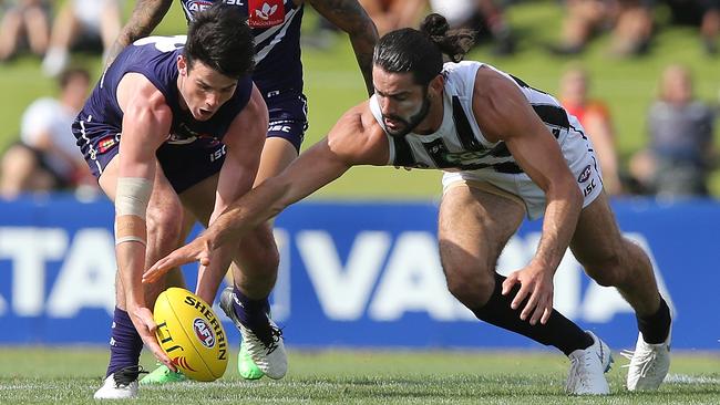 Andrew Brayshaw competes against Collingwood’s Brodie Grundy in the 2019 pre-season competition. Picture: Paul Kane/Getty