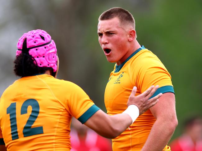 HAMILTON, NEW ZEALAND - OCTOBER 02: Kingsley Uys of Australia U18 (R) celebrates his  try during the match between Australia U18s and  New Zealand Barbarians at St Paul's Collegiate School, on October 02, 2024 in Hamilton, New Zealand. (Photo by Phil Walter/Getty Images for Rugby Australia)