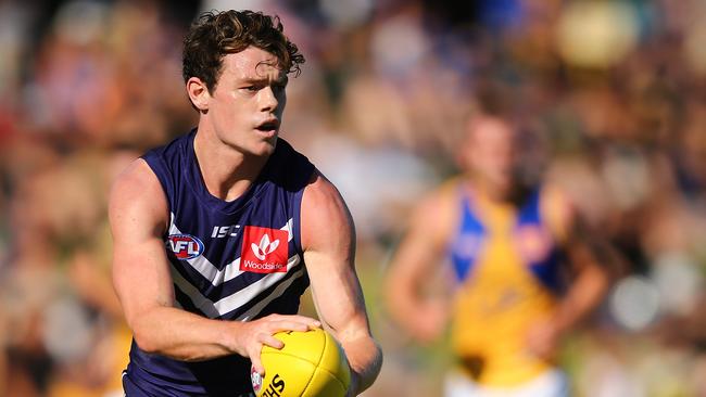 PERTH, AUSTRALIA - MARCH 11: Lachie Neale of the Dockers looks to pass the ball during the JLT Community Series AFL match between the Fremantle Dockers and the West Coast Eagles at HBF Arena on March 11, 2018 in Perth, Australia.  (Photo by Paul Kane/Getty Images)