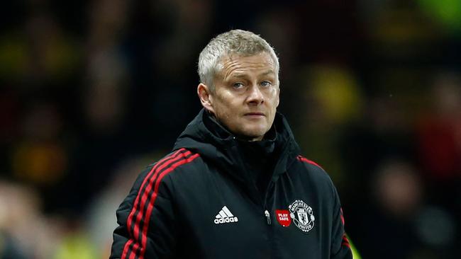 Manchester United's Norwegian manager Ole Gunnar Solskjaer reacts during the English Premier League football match between Watford and Manchester United at Vicarage Road Stadium in Watford, southeast England, on November 20, 2021. (Photo by Ian KINGTON / AFP) / RESTRICTED TO EDITORIAL USE. No use with unauthorized audio, video, data, fixture lists, club/league logos or 'live' services. Online in-match use limited to 120 images. An additional 40 images may be used in extra time. No video emulation. Social media in-match use limited to 120 images. An additional 40 images may be used in extra time. No use in betting publications, games or single club/league/player publications. /