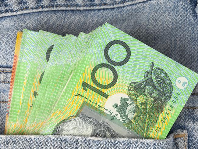 Australian 100 dollar notes in jeans pocket. money, wealthy, rich generic