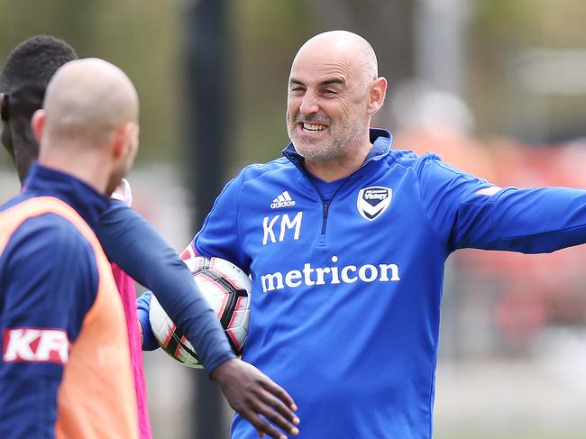 MELBOURNE, AUSTRALIA - DECEMBER 04: Victory head coach Kevin Muscat speaks to his players1 during a Melbourne Victory A-League training session at Gosch's Paddock on December 04, 2018 in Melbourne, Australia. (Photo by Michael Dodge/Getty Images)