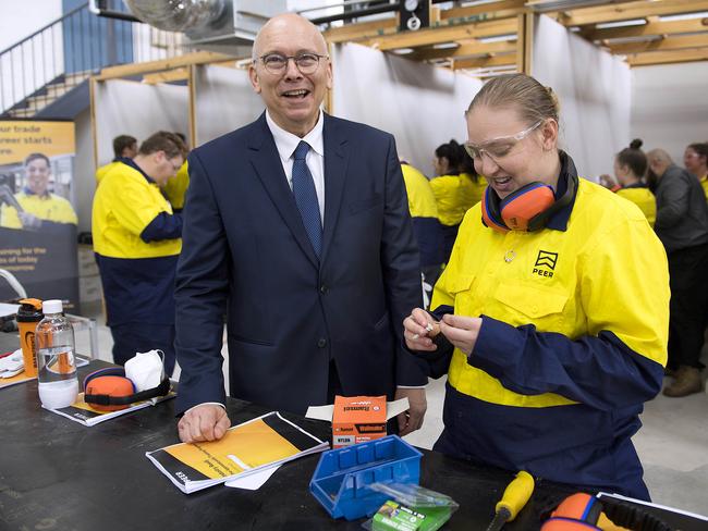 Hon David Pisoni MP Minister for Innovation and Skills chats to Bec Wells at Peer The Centre for Apprenticeships on Port Road Albert Park Friday February 7,2020.(Image AAP/Mark Brake)