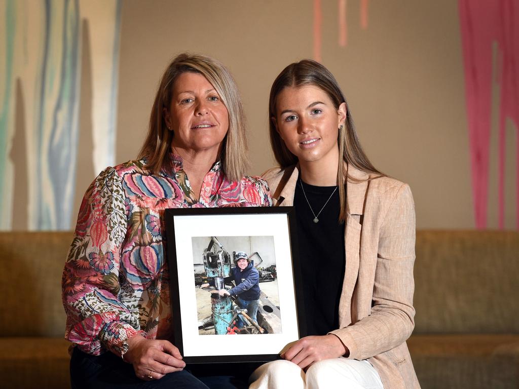 Erryn and Imogen Williams with a photo of their beloved Harvey. Picture: David Smith