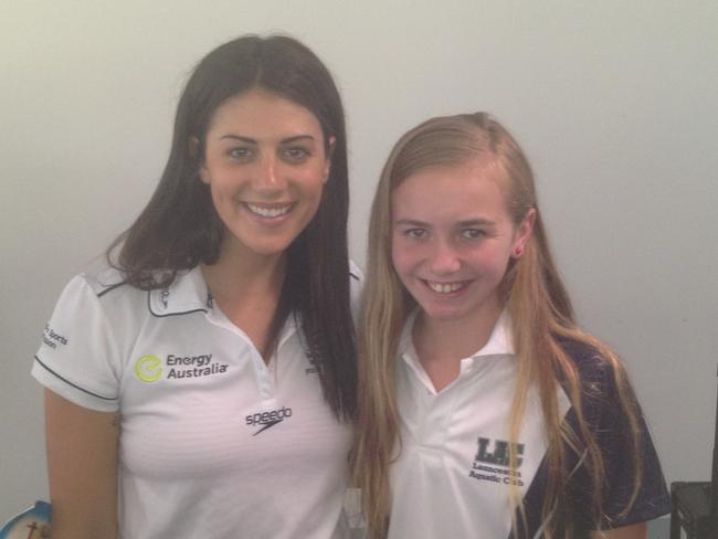 Australian swimmer Ariarne Titmus (right) meeting her childhood idol Stephanie Rice. Photo supplied by Steve Titmus.