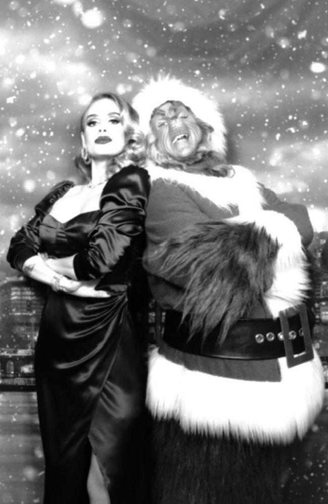 Adele looks glam in this new Christmas snap.