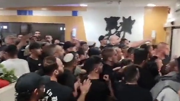 A large mob including members of a football supporters group attempt to storm a hospital where a Hamas terrorist is being treated.