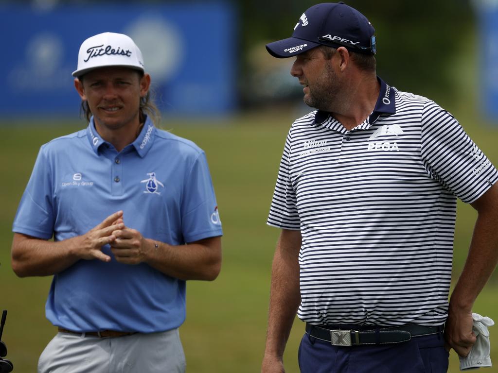 Cameron Smith (left) and Marc Leishman are ready to defend their title. Picture: Chris Graythen/Getty Images/AFP
