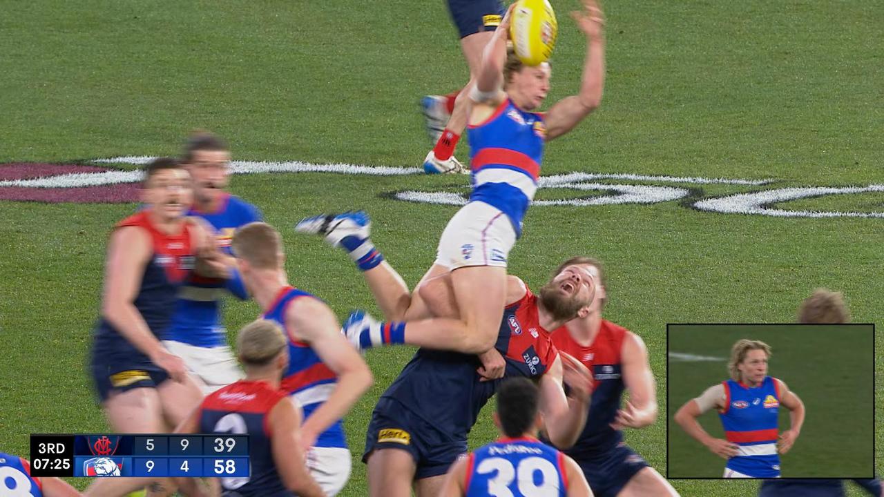 Cody Weightman took this huge mark over Max Gawn.