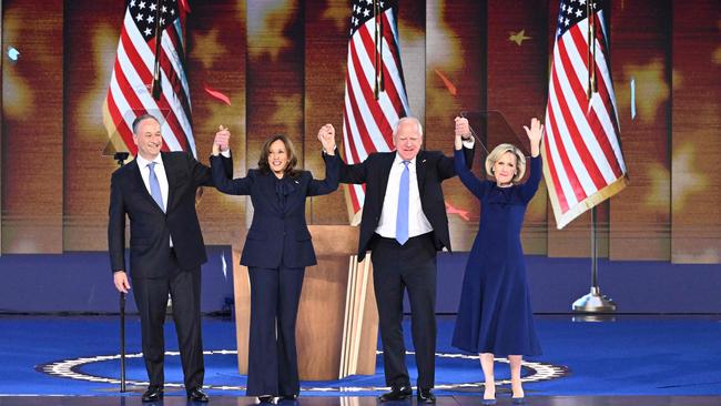 Kamala Harris onstage with Second Gentleman Douglas Emhoff, Tim Walz and his wife Gwen Walz at the DNC. Picture: AFP.