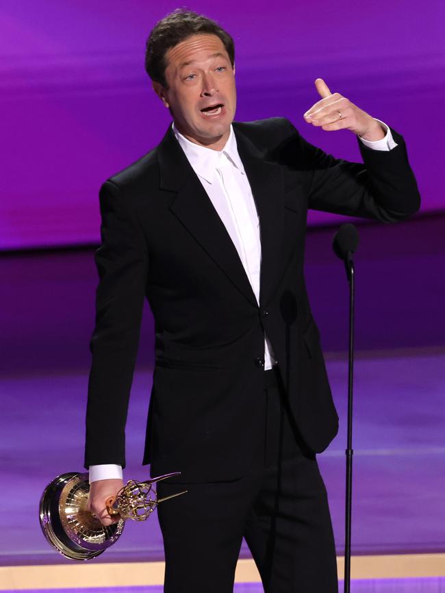 Ebon Moss-Bachrach accepts the Outstanding Supporting Actor in a Comedy Series award for The Bear. Picture: Kevin Winter/Getty Images