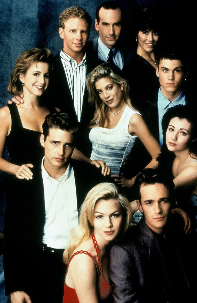 With her Beverly Hills, 90210 co-stars.