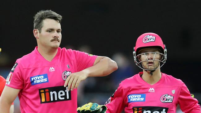 Ben Manenti celebrates after dismissing Sam Harper of the Renegades during the Big Bash League game in December.