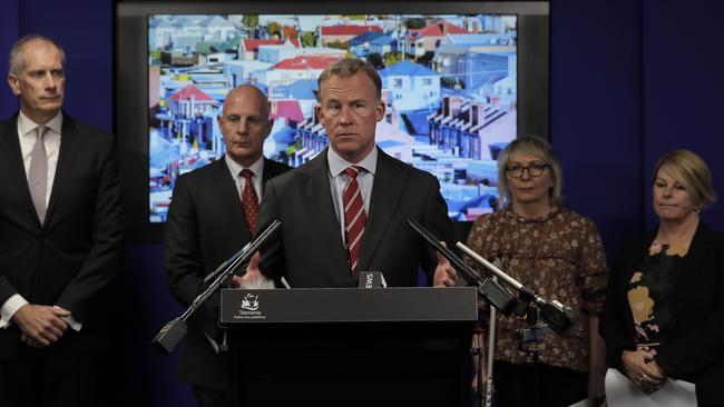 Premier Will Hodgman, centre, speaking about the urgent need for more housing in Tasmania. Picture: LUKE BOWDEN