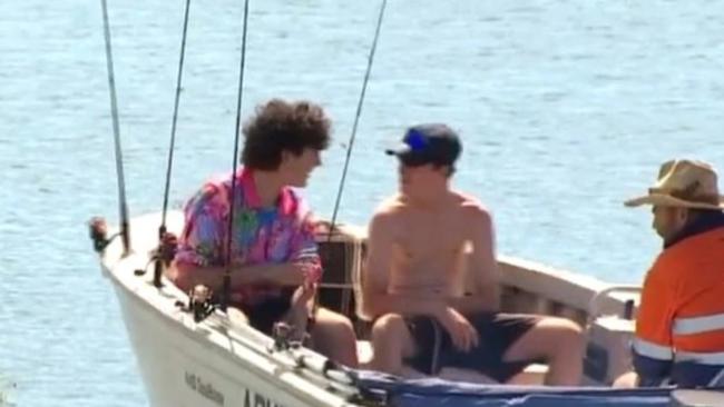 Noah Billios (left) performed CPR on Mr Muller after pulling him and the driver of the boat from the water. Photo: Screenshot from 7 News Wide Bay