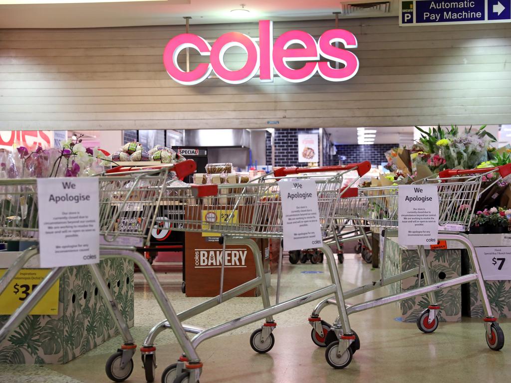 Trolleys bar the way at Coles in Sydney’s Edgecliff, which was closed Friday afternoon along with stores nationally due to an IT issue. Picture: Damian Shaw