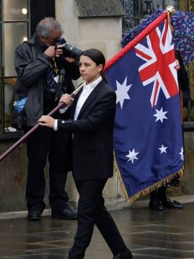 Sam Kerr carries the flag for Australia at the Kings Coronation today. Source – https://www.instagram.com/matildas/