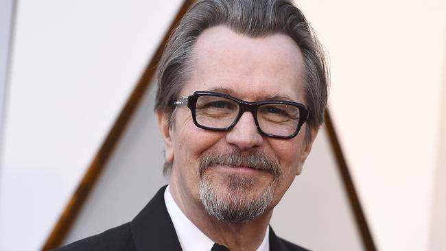 Gary Oldman arrives at the Oscars on Sunday, March 4, 2018, at the Dolby Theatre in Los Angeles. (Photo by Jordan Strauss/Invision/AP)