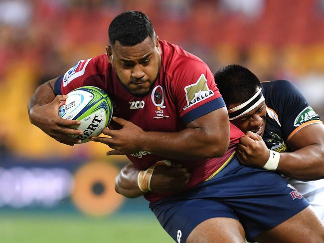 Taniela Tupou of the Reds (left) is tackled by Allan Alaalatoa of the Brumbies during the Round 3 Super Rugby match between the Queensland Reds and the Brumbies at Suncorp Stadium in Brisbane, Friday, March 2, 2018. (AAP Image/Dan Peled) NO ARCHIVING, EDITORIAL USE ONLY