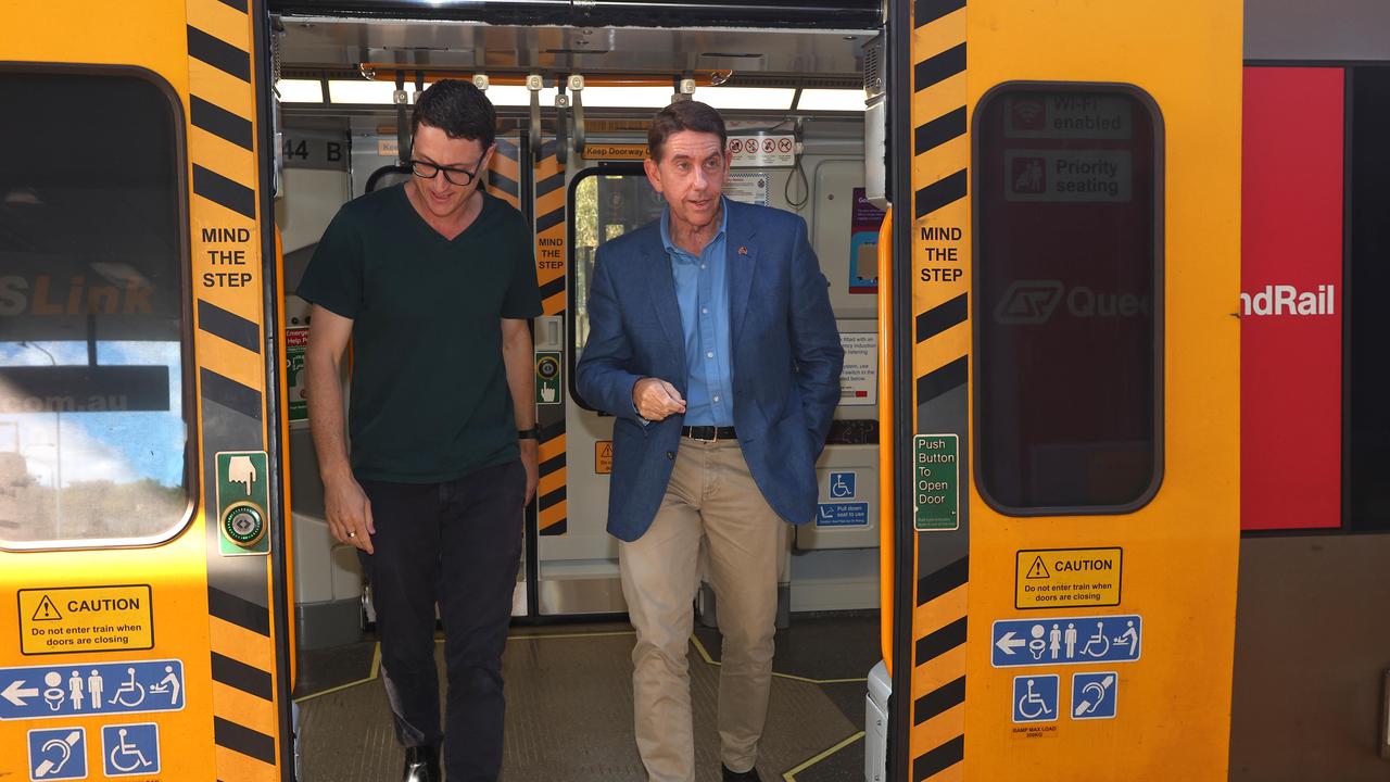 Treasurer Cameron Dick and Transport Minister Bart Mellish pictured at Mango Hill Station announcing 50c fares. Picture: David Clark.