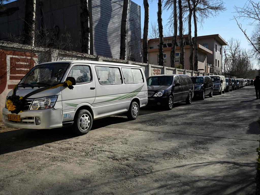 Huge lines of hearses piled up outside funeral homes that struggled to cope with demand. Picture: AFP.