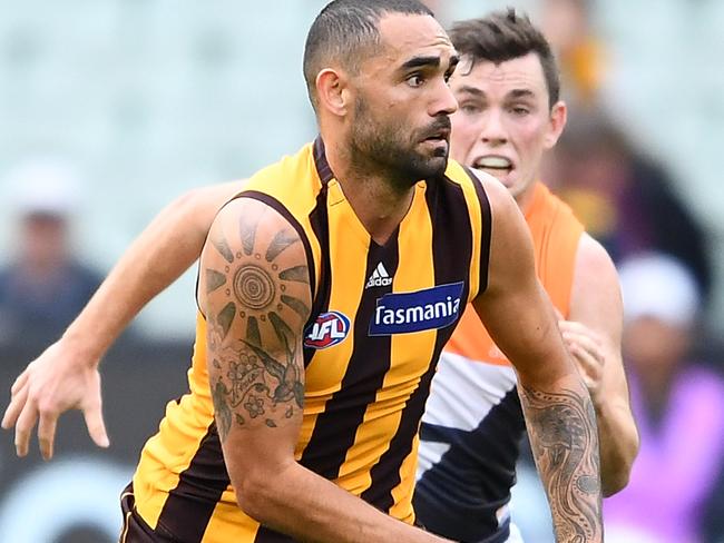 MELBOURNE, AUSTRALIA - MAY 12: Shaun Burgoyne of the Hawks kicks during the round eight AFL match between the Hawthorn Hawks and the Greater Western Sydney Giants at Melbourne Cricket Ground on May 12, 2019 in Melbourne, Australia. (Photo by Quinn Rooney/Getty Images)