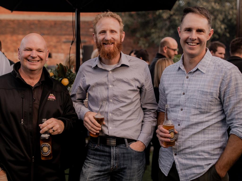 Michael Stylianou, left, Andrew Stuart and James Barrett, all of Launceston, at the the relaunch of Boag’s St George beer. Picture: ROSIE HASTIE