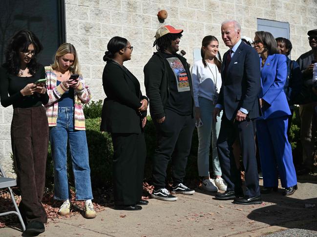 US President Joe Biden greets voters outside a polling as he casts his vote in Delaware. Picture: AFP