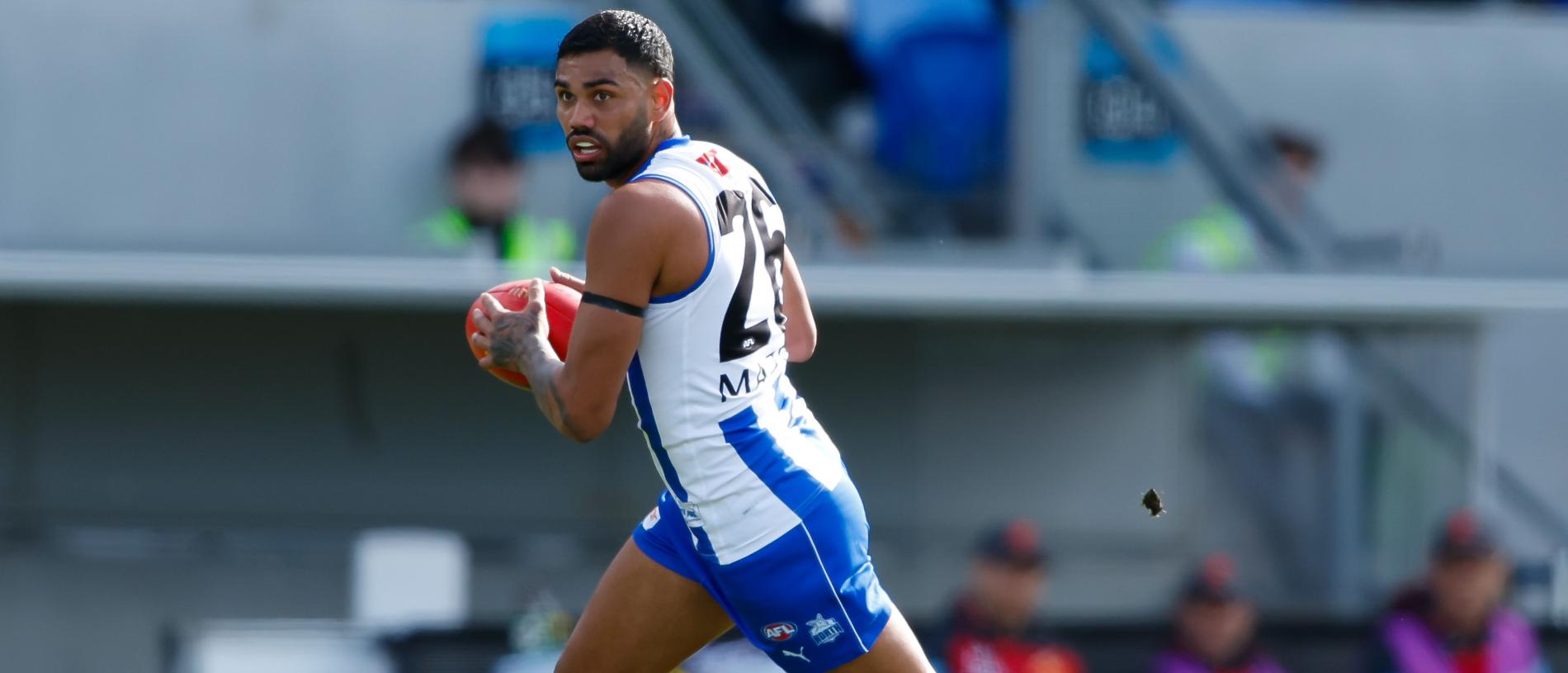HOBART, AUSTRALIA - AUGUST 26: Tarryn Thomas of the Kangaroos in action during the 2023 AFL Round 24 match between the North Melbourne Kangaroos and the Gold Coast SUNS at Blundstone Arena on August 26, 2023 in Hobart, Australia. (Photo by Dylan Burns/AFL Photos via Getty Images)