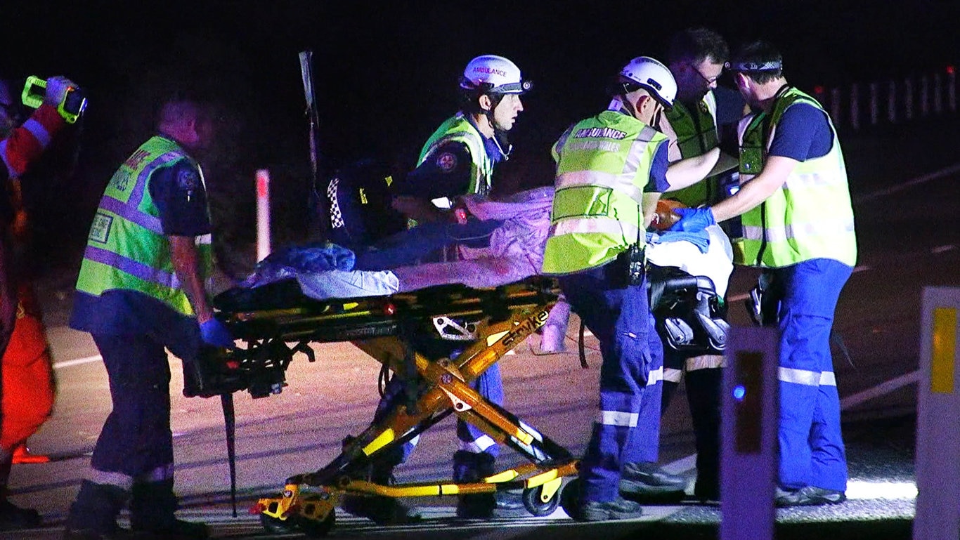 Two men were killed and one woman injured in a single-vehicle roll-over on the Pacific Highway near Glenugie on Sunday night. Picture: Frank Redward