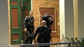 Tristane Shane William Webb is escorted from Gympie District Court. He was supported by his mother as the disturbing nature of his crimes was read out in a sentencing hearing which lasted more than three hours.