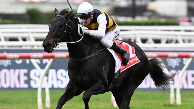 Blake Shinn lands a demolition job to win the Group 1 Queensland Derby on Warmonger at Eagle Farm. Picture: Grant Peters - Trackside Photography