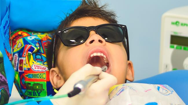 A child visits the dentist