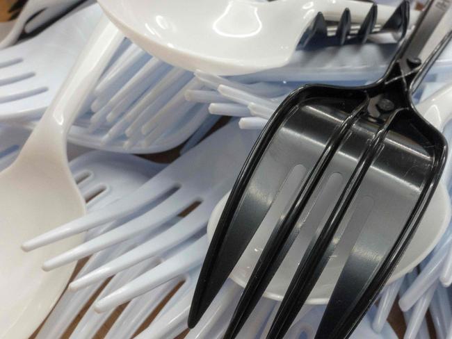 Plastic cutlery will face being banned from Queensland from July 1, 2021. Picture: AFP/Paul J. Richards