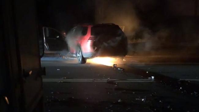 The car caught alight after the impact. Picture: 9 News Illawarra.