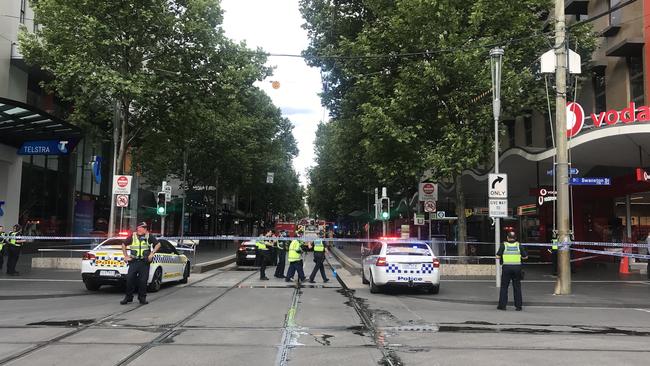 One of Melbourne’s busiest streets lay deserted afterwards. Picture: AAP Image/Benita Kolovos