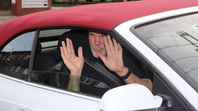 Lisa Wlkinson’s partner Peter FitzSimons, pictured outside the couple’s Neutral Bay home yesterday, said his wife was enjoying a sleep in. Picture: John Grainger