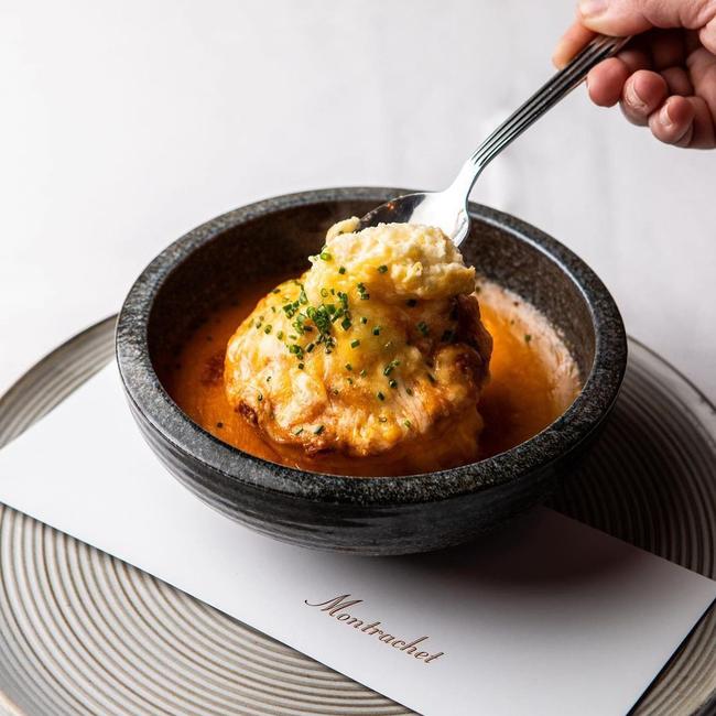 Montrachet's Soufflé au crabe et au gruyère – double baked soufflé with crabmeat &amp; gruyère cheese finished with a light cream bisque. Picture: Montrachet